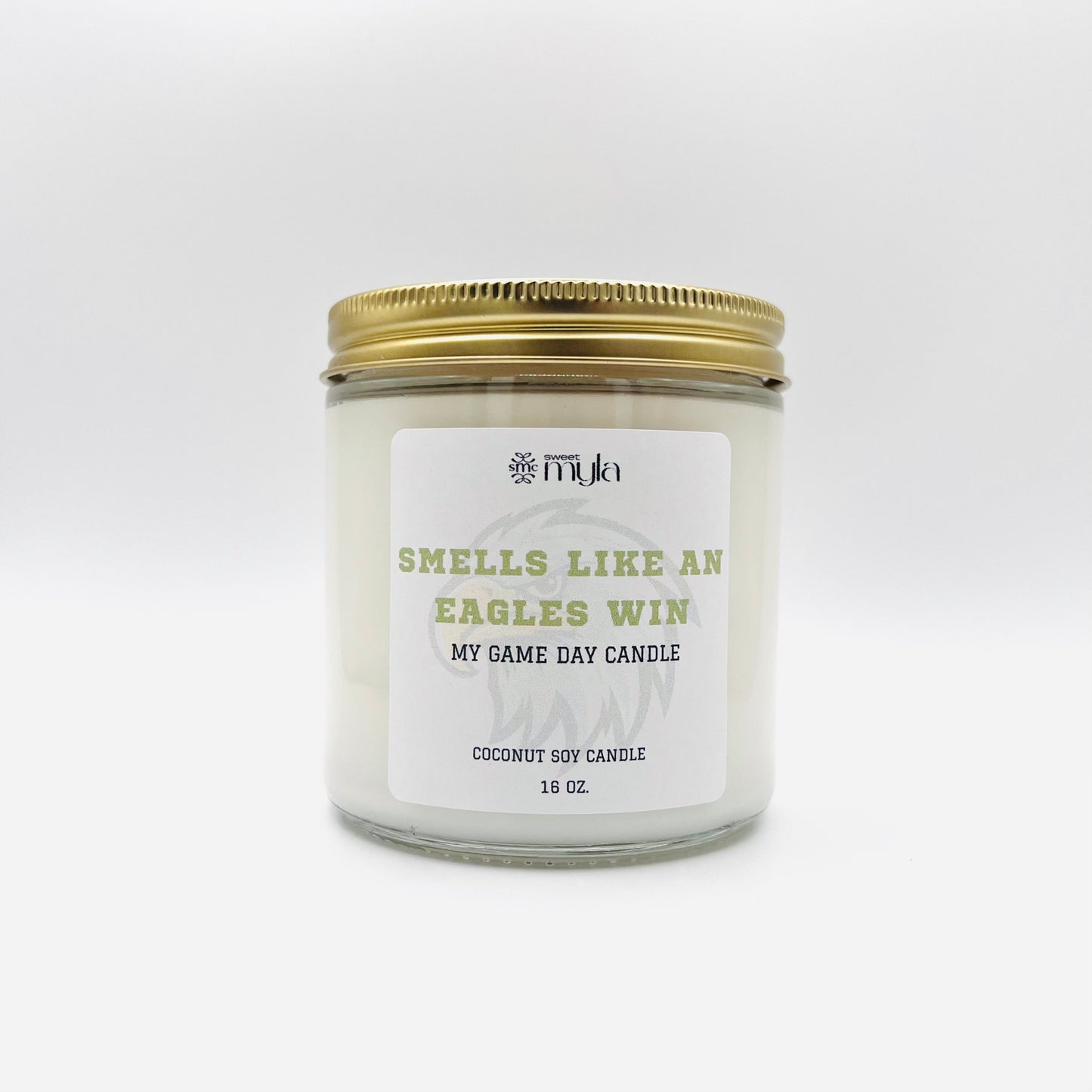 Candle with label that says Smells like an Eagles Win