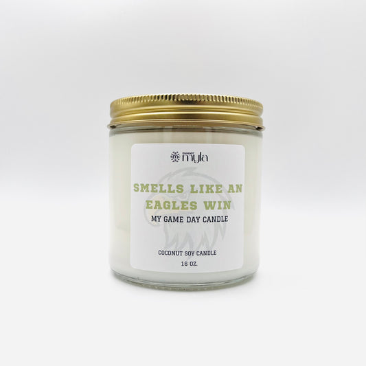Candle with label that says Smells like an Eagles Win
