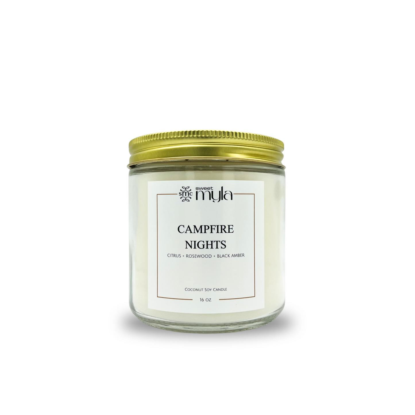 Candle labeled 'Campfire Nights' with a gold lid on a white background