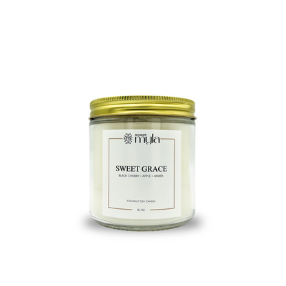 Candle jar labeled 'Sweet Grace' by Sweet Myla on a white background