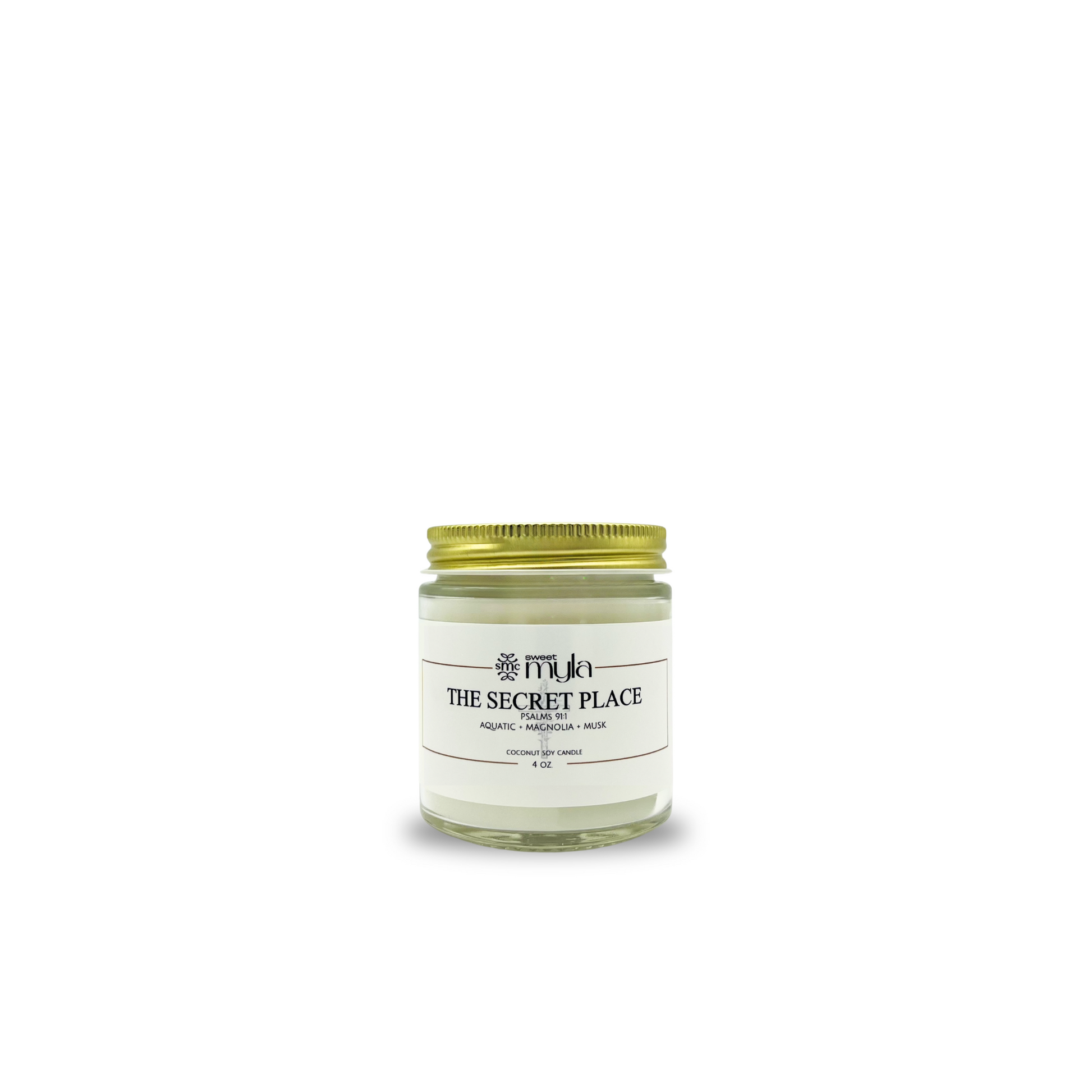 Candle with a gold lid with scents of aquatic, grapefruit, magnolia, musk with'The Secret Place' label on a white background