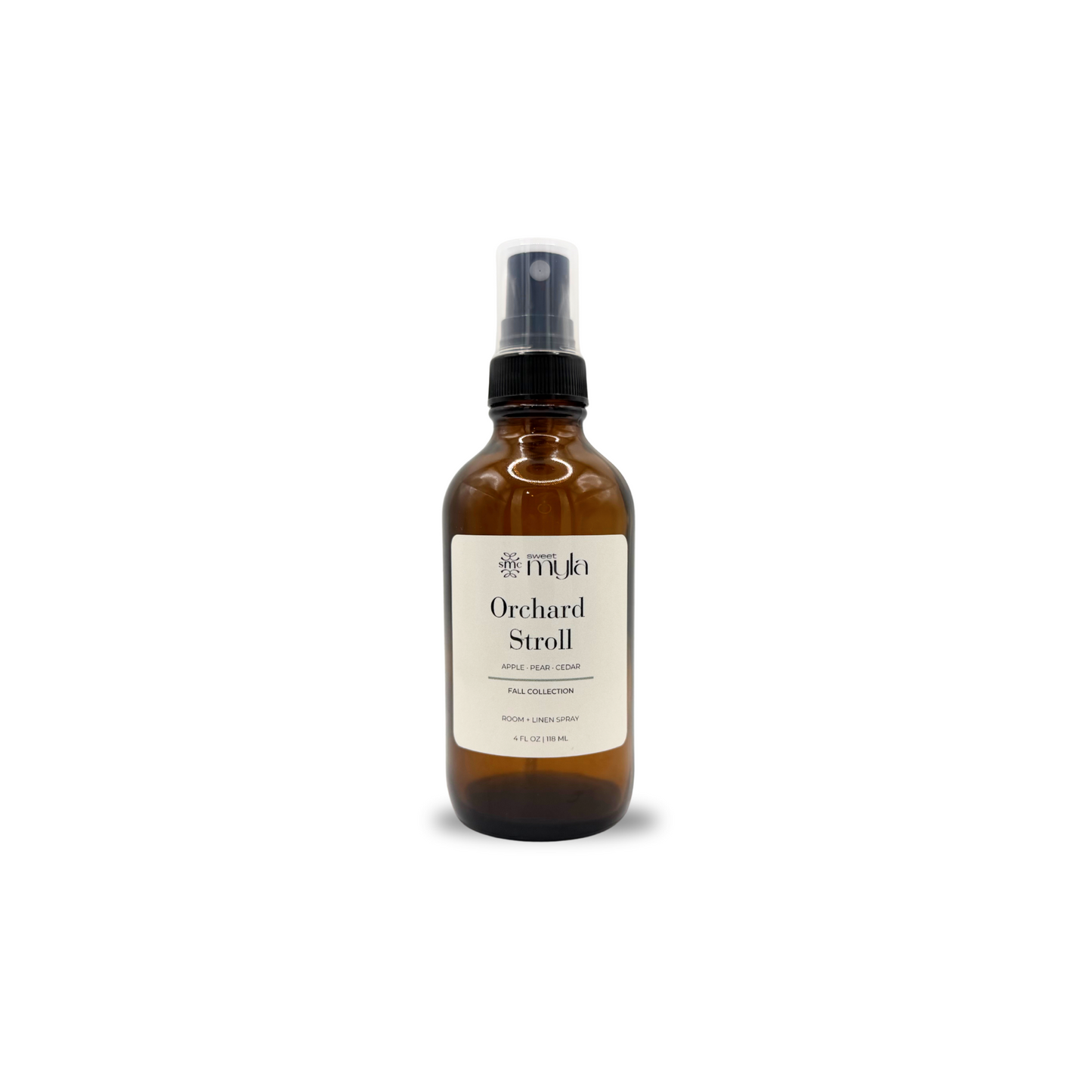 Room spray in an amber bottle with a label that reads orchard stroll by Sweet Myla. 