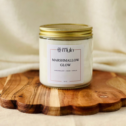 16oz. candle labeled 'Marshmallow Glow'