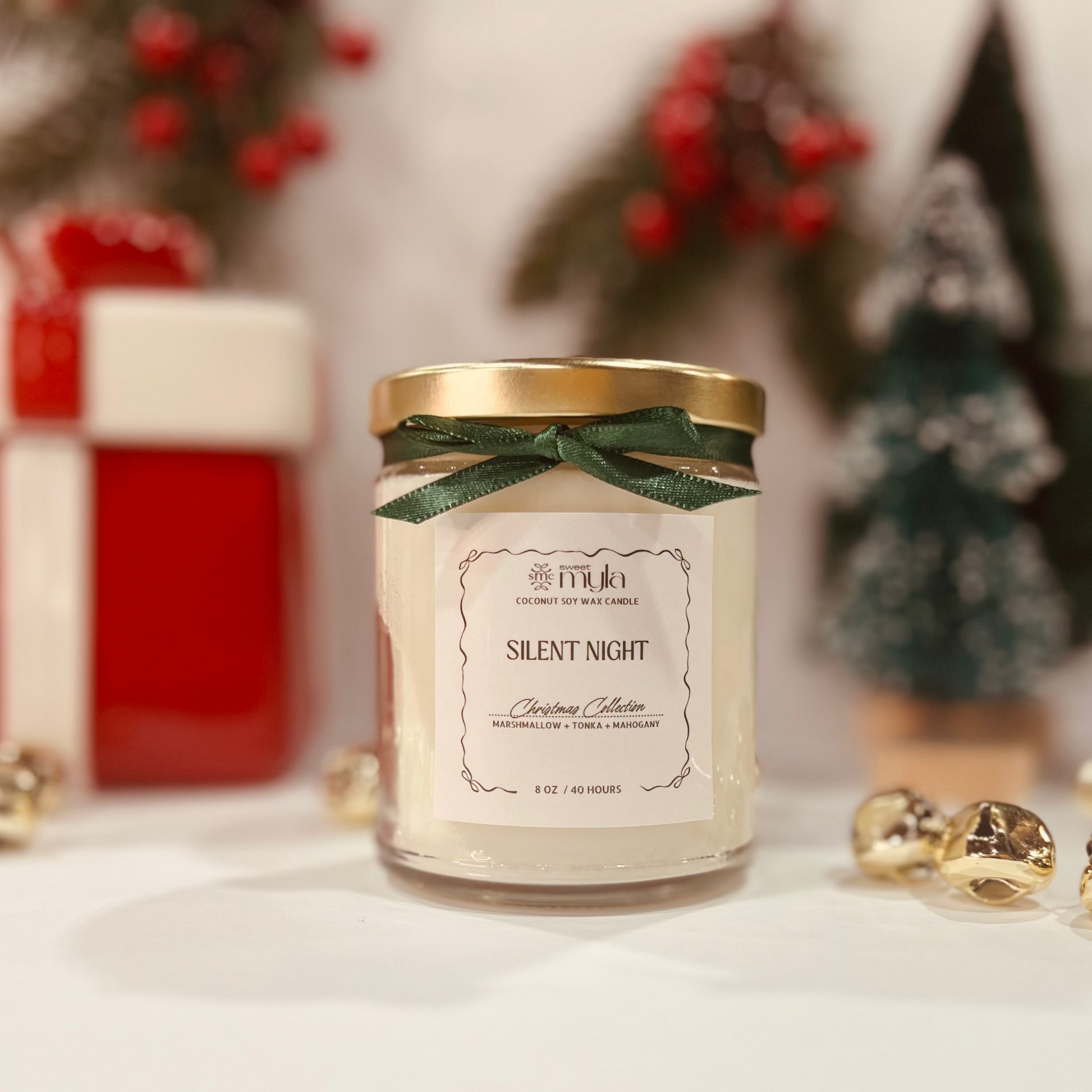 Candle labeled 'Silent Night' with decorative elements on a festive background