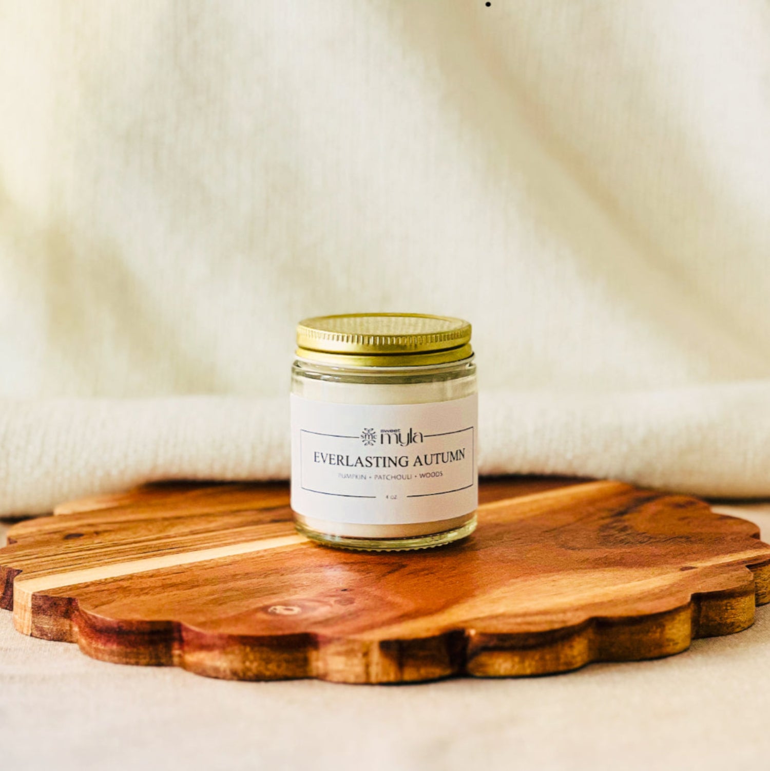 4oz. candle jar labeled 'Everlasting Autumn'