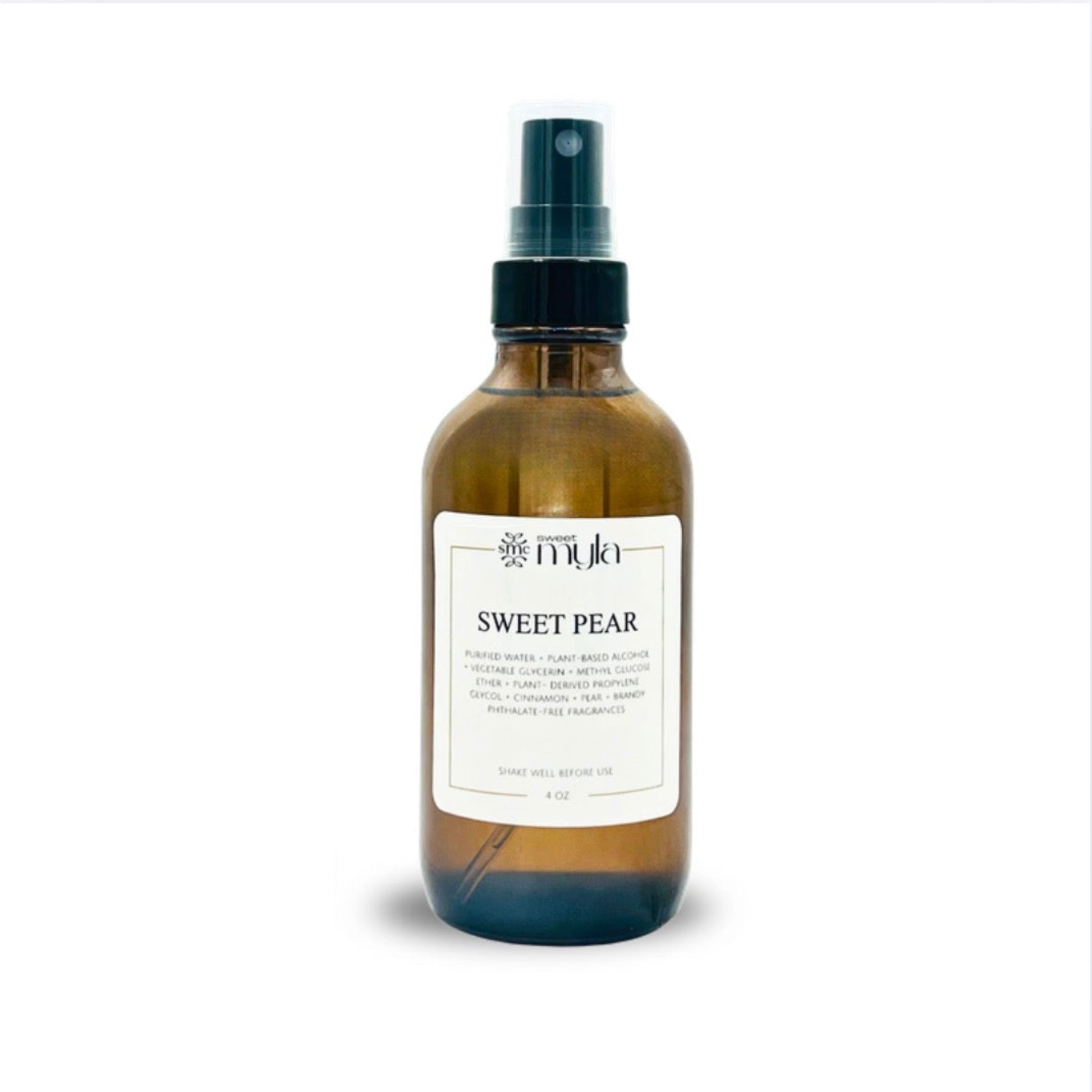 Brown room + linen spray bottle labeled 'Sweet Pear' on a white background