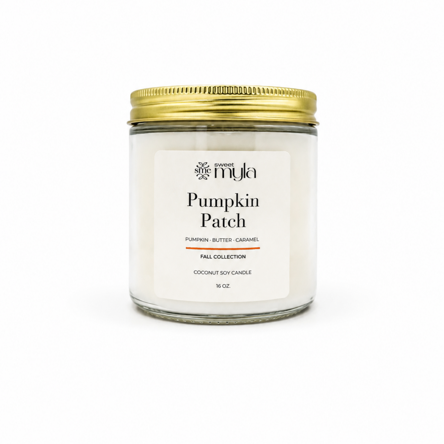A 16 oz soy candle in a clear glass jar with a white label and a gold metal lid, labeled 'Pumpkin Patch' by the brand Sweet Myla