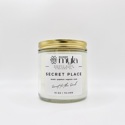 Secret Place Candle with scents of aquatic, grapefruit, magnolia, musk