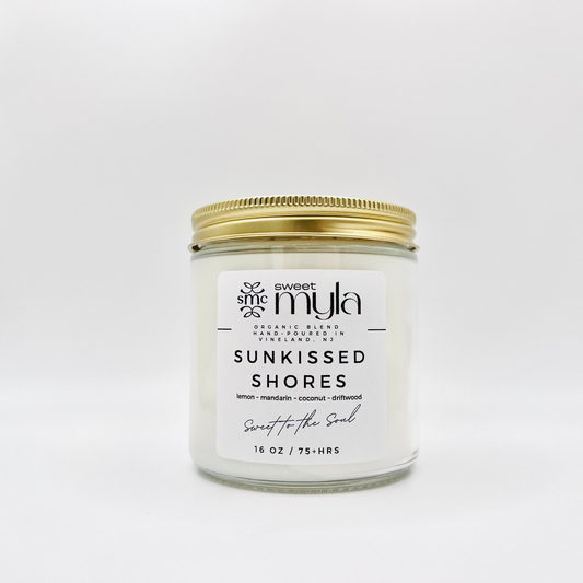 Sun-kissed Shores Candle with scents of lemon, mandarin, coconut, driftwood