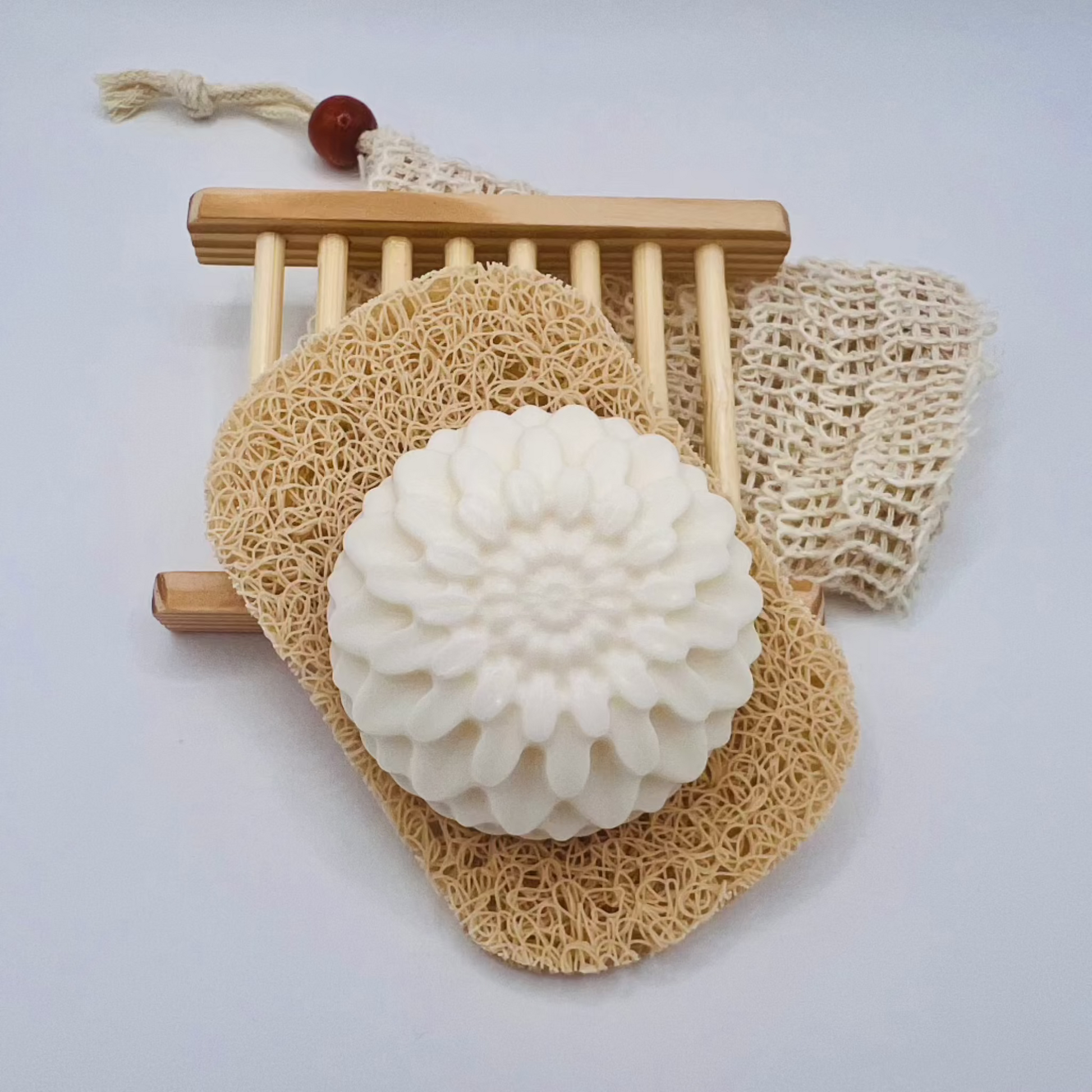 A melt & pour soap with exfoliating bag and soap dish. 